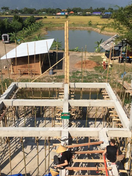 first buildings 2019_garage and family house (2) close up shot of foundation build for farm house